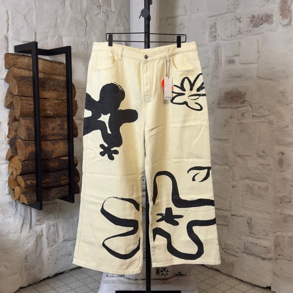 Cider Denim - NWT | Cider | Artistic Wide-Leg Jeans with Black Floral Abstract Design